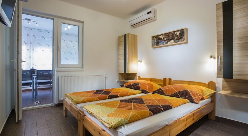 Апартаменты Negga Apartman Хайдусобосло Номер фото