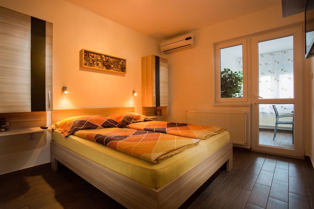 Апартаменты Negga Apartman Хайдусобосло Номер фото