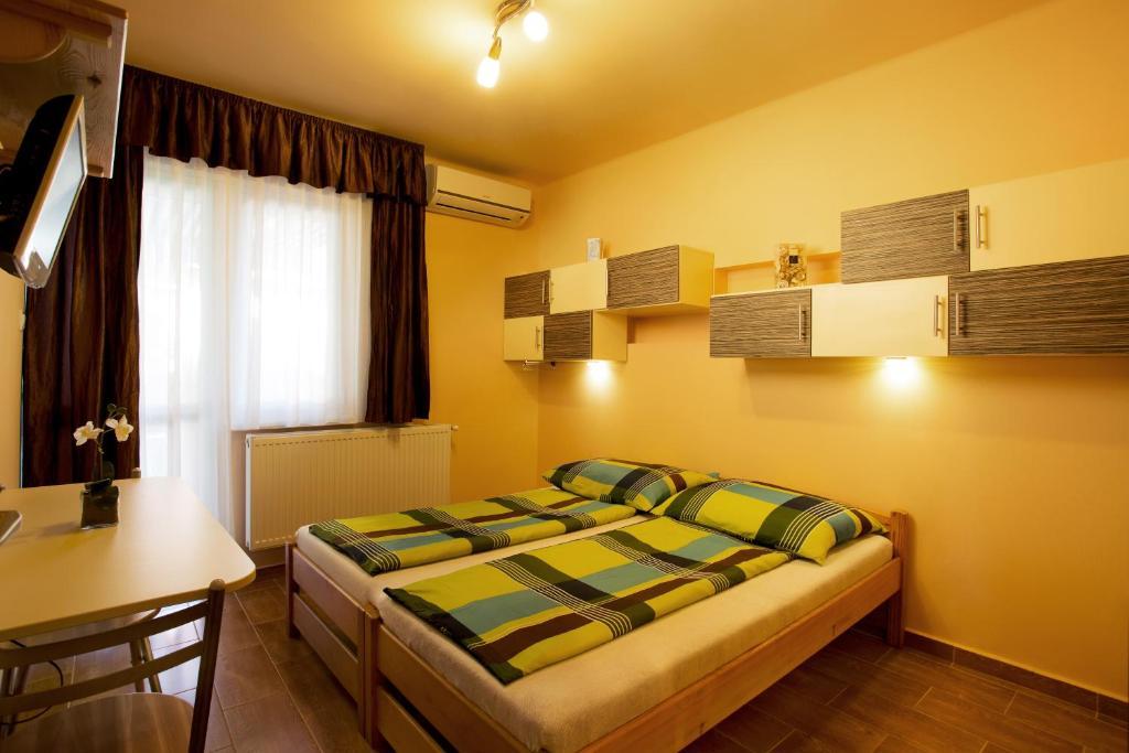 Апартаменты Negga Apartman Хайдусобосло Номер фото